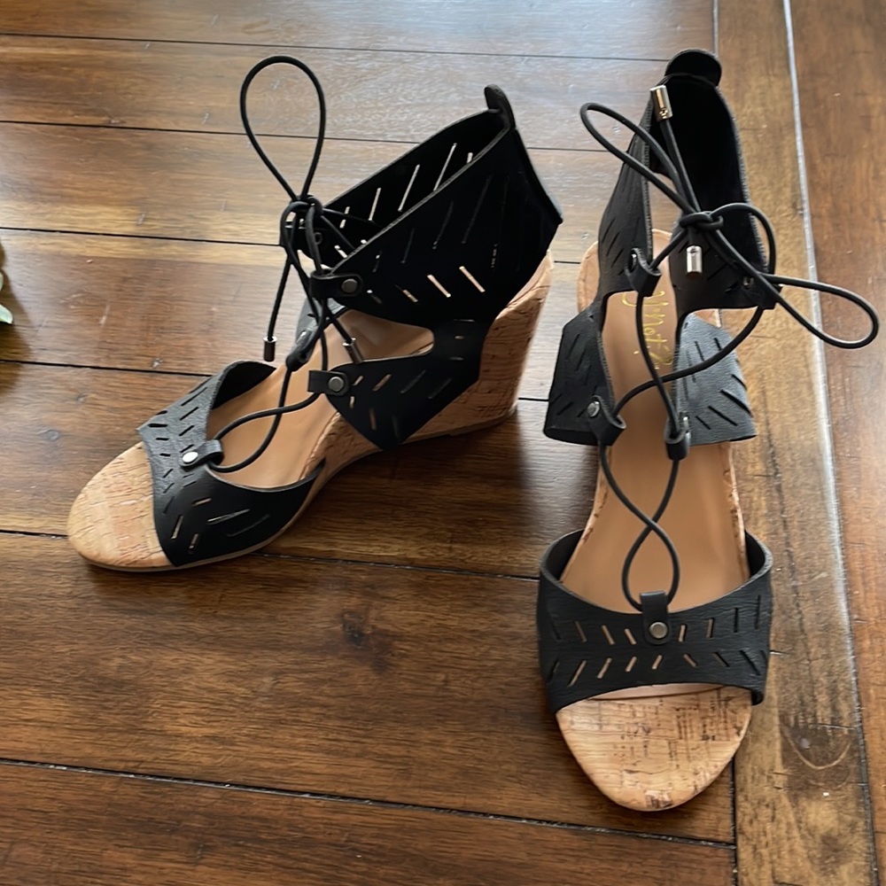 Like New Black cut out perforated lace up cork wedge sandal, size 7